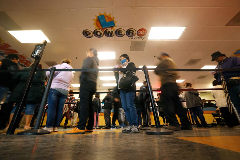 Powerball jackpot swells to record $1.9 billion
